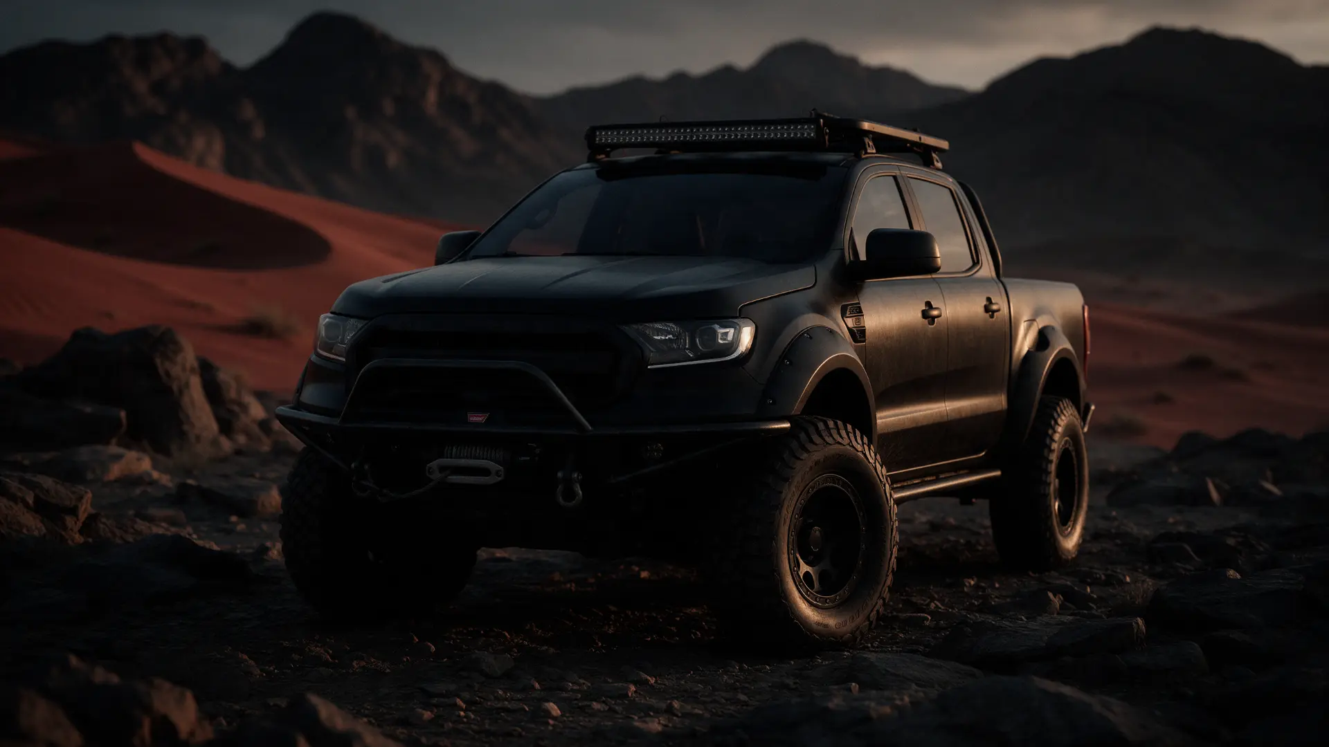 Customized black off-road vehicle in a rocky desert at dusk